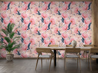 Watercolor flower wallpaper in a dining room with a wooden table and chairs.