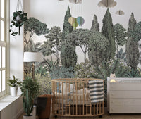 Tropical jungle mural with rich leafy details in a nursery.
