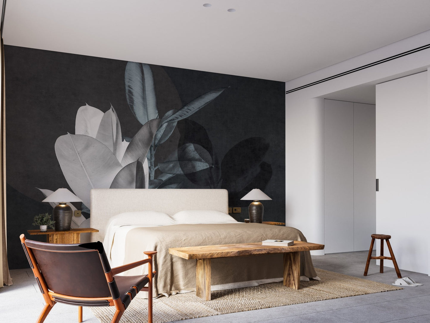Large bedroom with wooden accents and grey leaf texture wall mural.