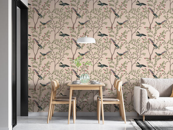 Light pink wallpaper with grey bird illustrations in a brightly lit dining room.