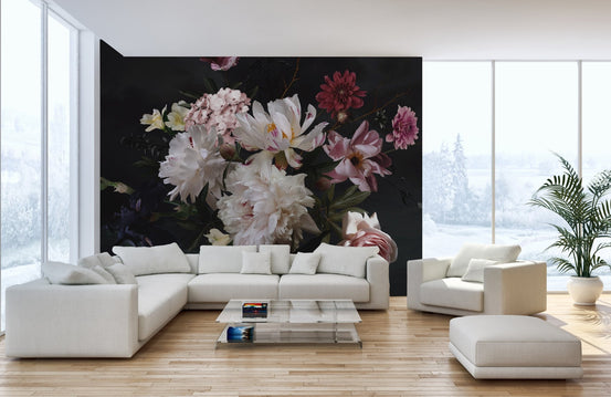 Large flower wallpaper mural with white peonies behind a white sectional sofa.