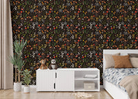Botanical mushroom wallpaper in a bedroom behind a white cabinet and bed.