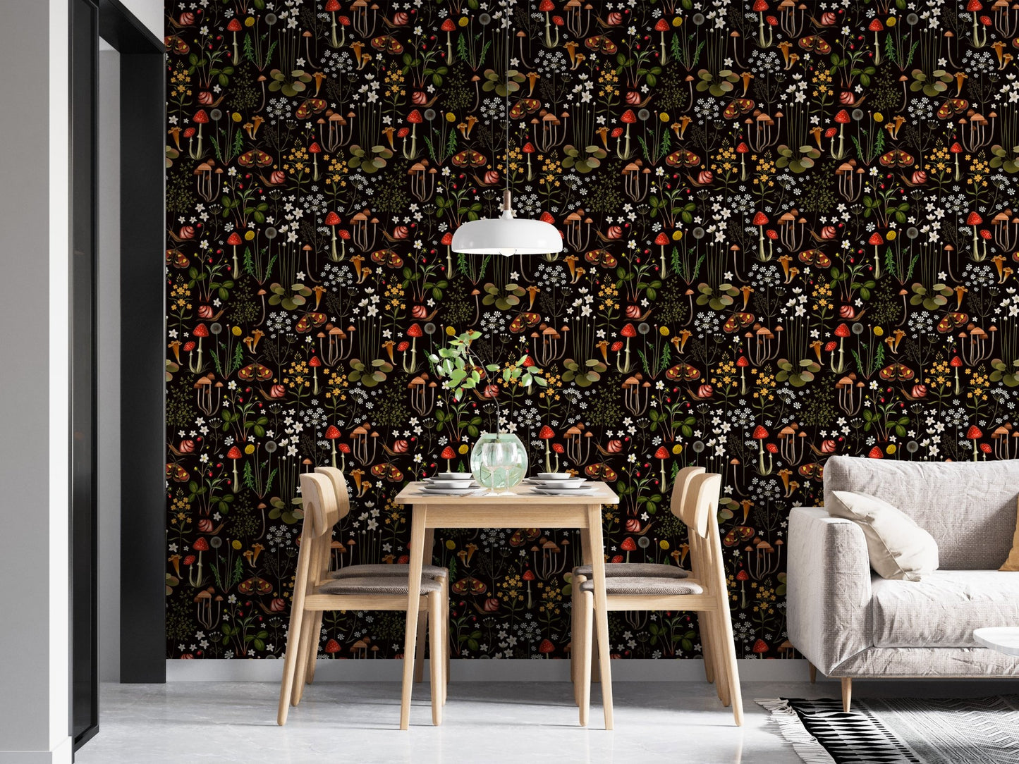 Modern dining space with a dark botanical flower wallpaper and wooden chairs.