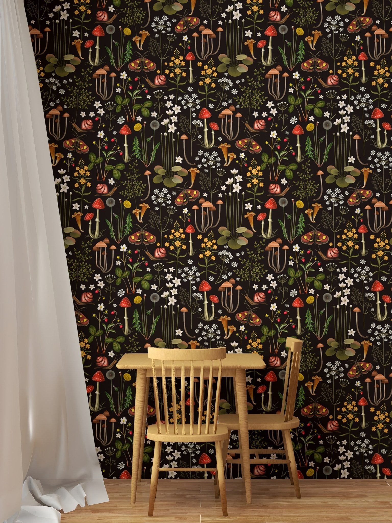 Small wooden dining table set against a dark mushroom and flower wallpaper.