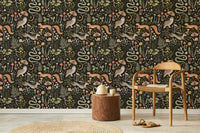 Seamless animal pattern wallpaper in a living room with a round rug and chair.
