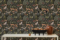 Whimsical forest wallpaper with fairies and dark tones in dining area.