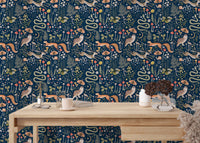 Seamless forest pattern wallpaper with foxes and ferns in a home.