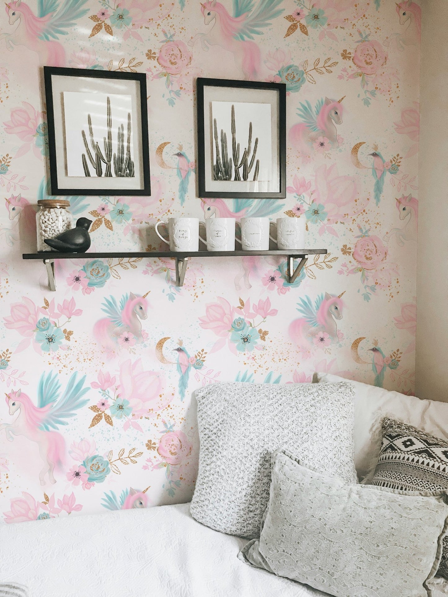 Unicorn and floral wallpaper on a feature wall in a bright living space.
