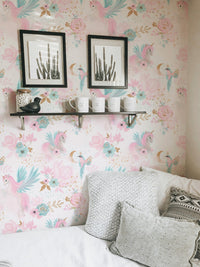 Unicorn and floral wallpaper on a feature wall in a bright living space.