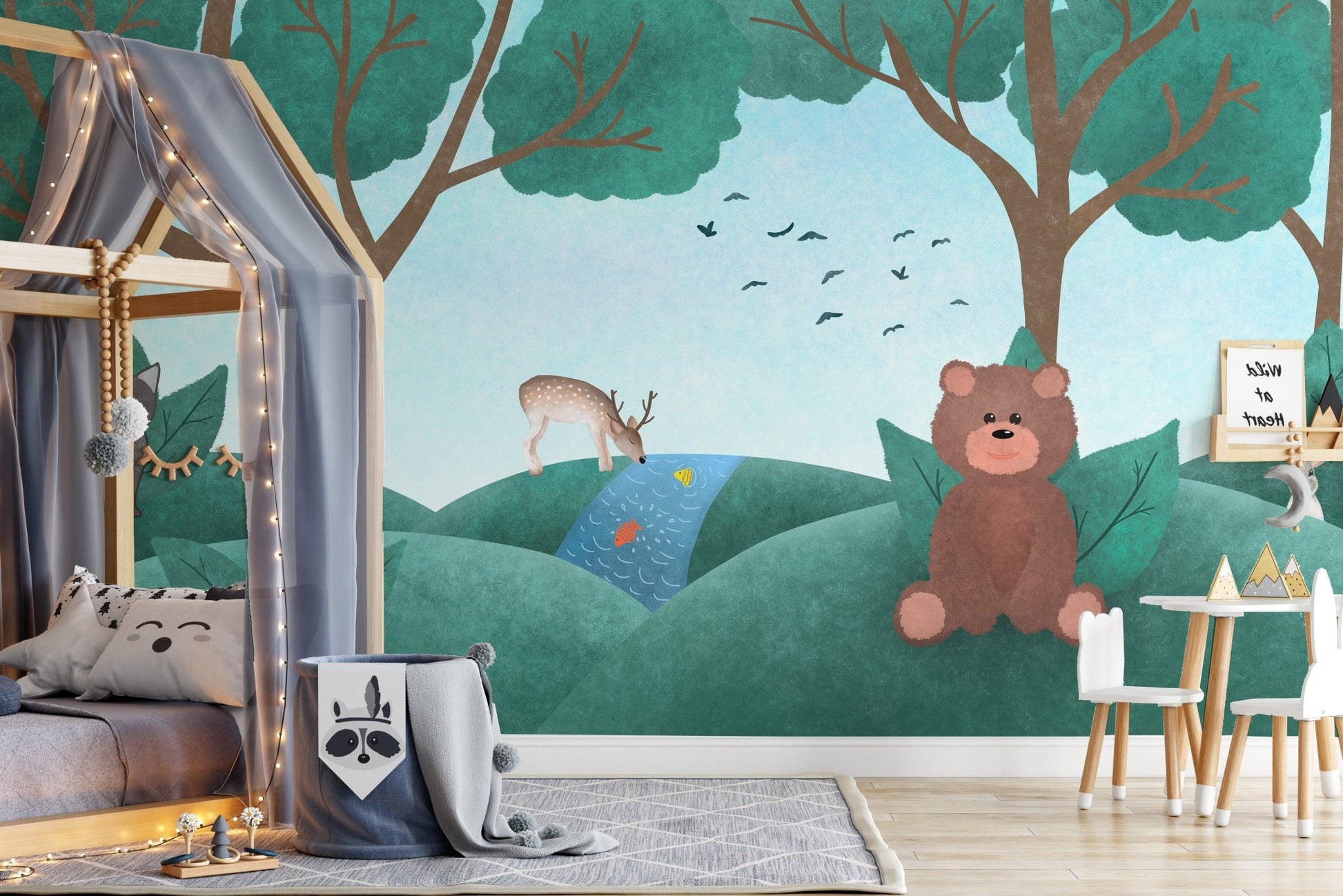 Magical kids' wall mural with fairyland animals and scenery in toddler room.
