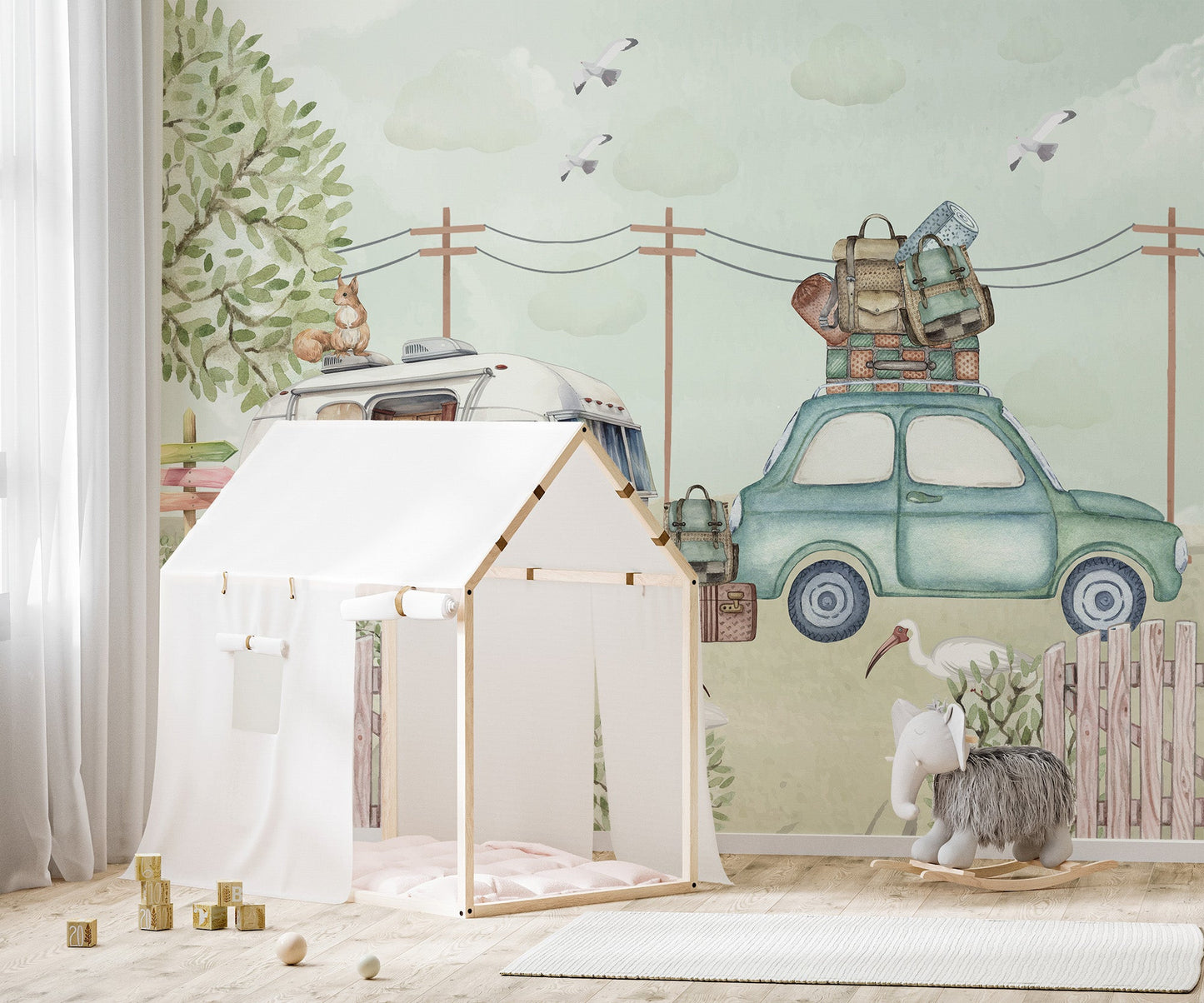 Vintage road trip wall mural with car and stacked bags.