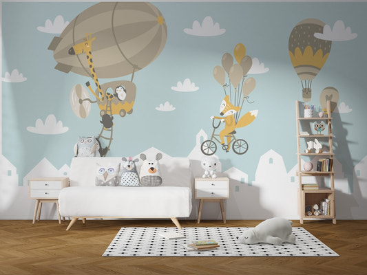 Modern living room with a grey and blue animal safari wall mural behind a white sofa.