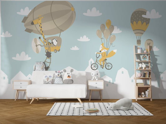 Modern living room with a grey and blue animal safari wall mural behind a white sofa.