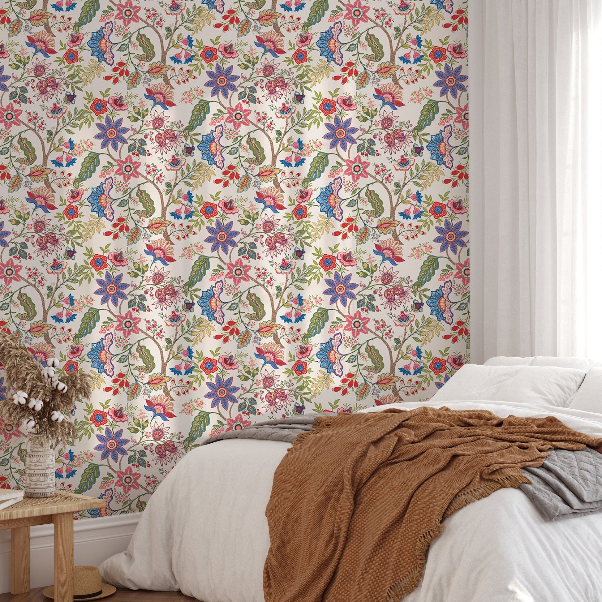 Bedroom wallpaper featuring multicolored floral embroidery style and white linens.