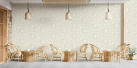 Elegant face pattern mural with symmetrical linework for cafe area.