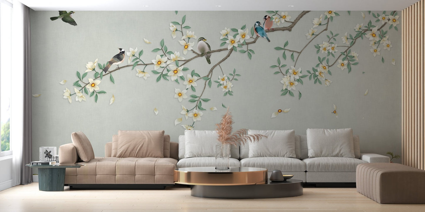 Modern living area with white seating and nature-inspired canopy wall mural.