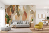 Festive brushstroke wallpaper mural in beige and gold color tones.
