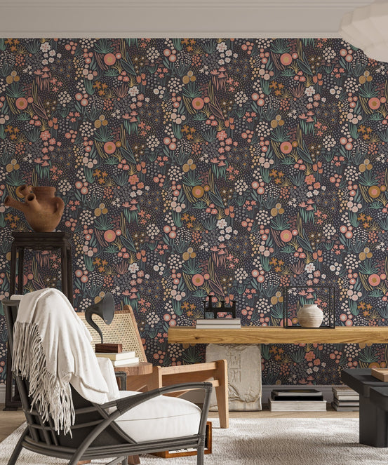 Field Pastel Colorful Repeat Pattern Flower Wallpaper in a living area with a wooden bench.