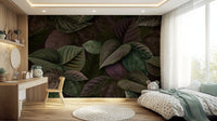 Green leafy mural in a guest bedroom suite