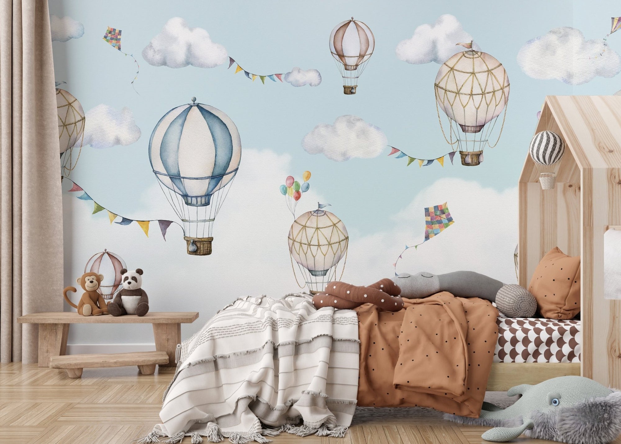Floating balloon sky wallpaper mural with soft blue clouds and pastel hot air balloons.
