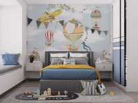 Kids bedroom wall mural featuring colorful hot air balloons and clouds.