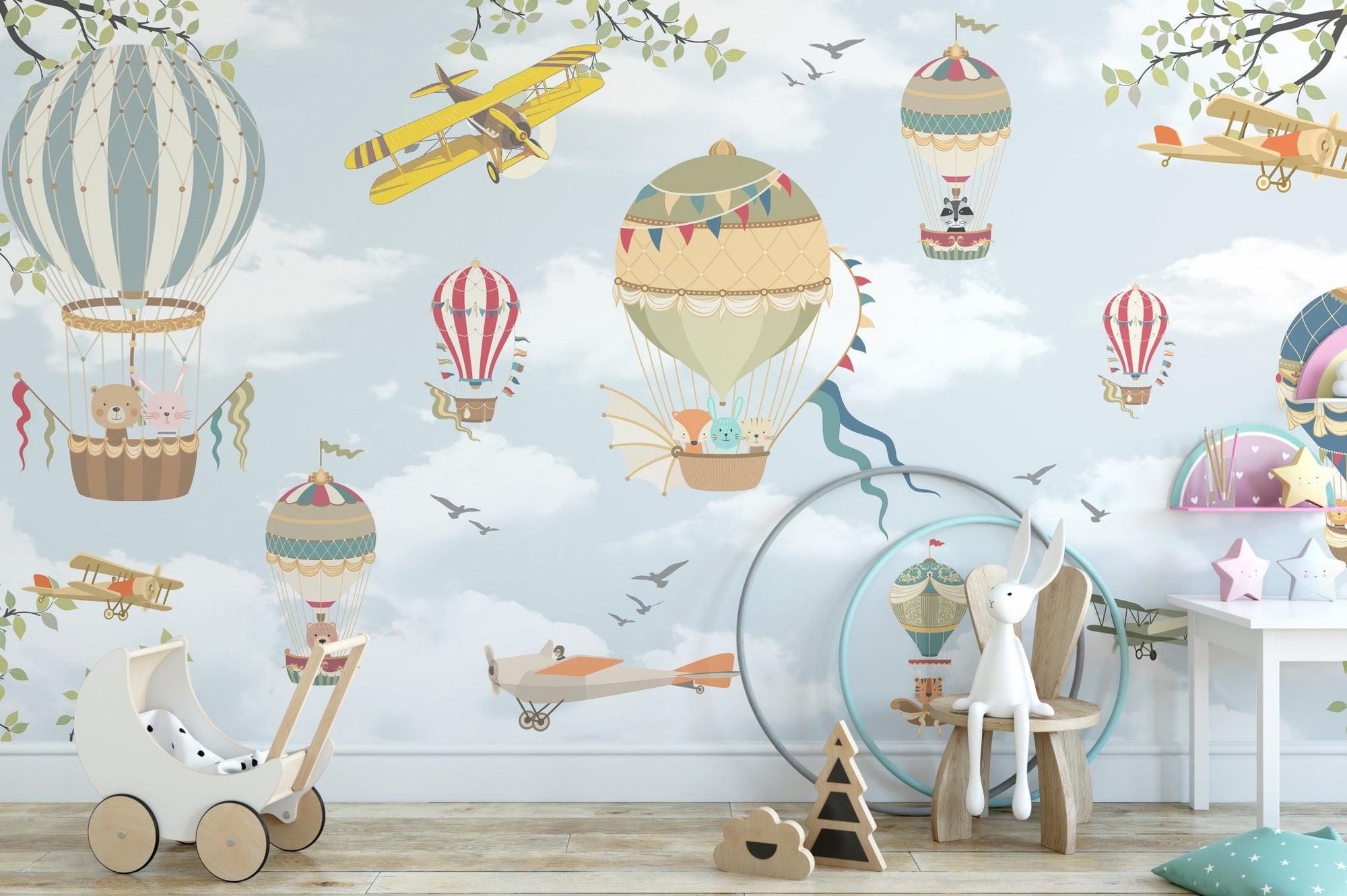 Playroom wall mural featuring blue skies, planes, and colorful balloons.