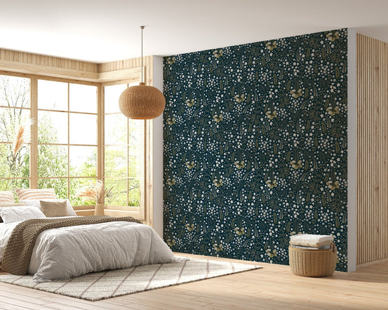 Floral dark blue background leaves removable wallpaper in a bright bedroom.
