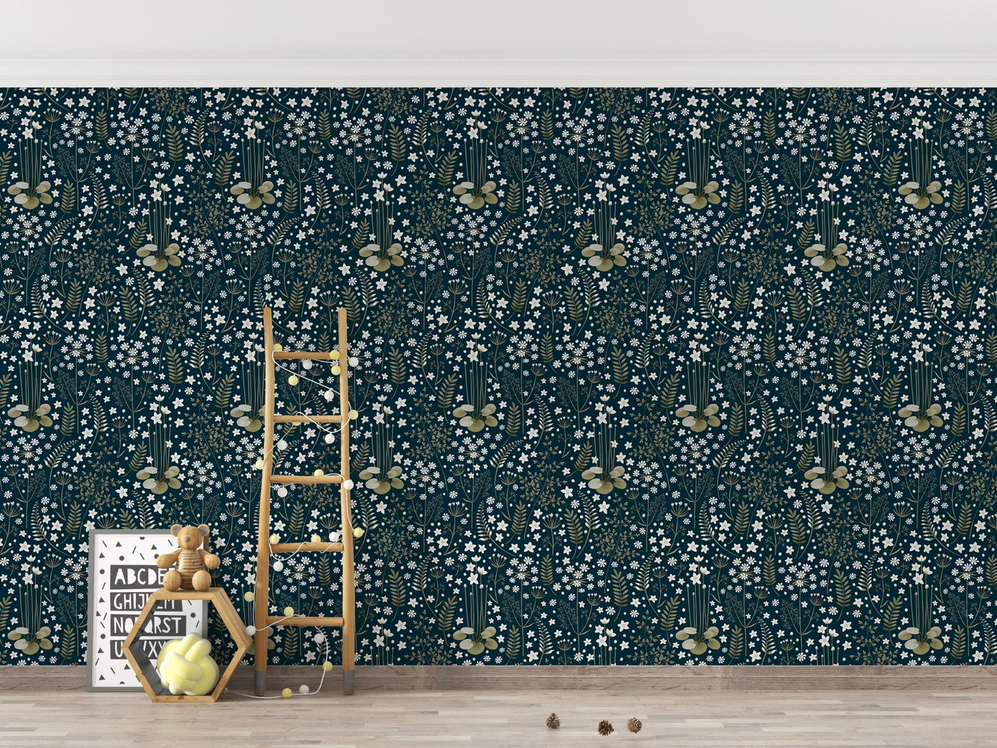 Floral wallpaper in a playroom with wooden toys and a small ladder.