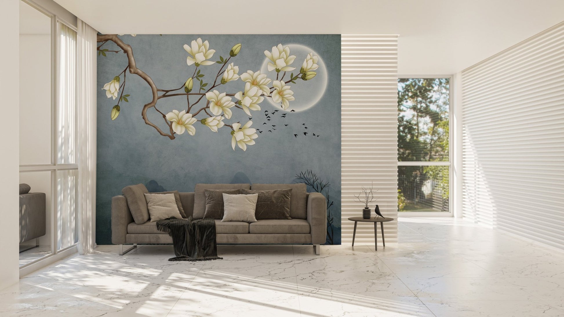 Blue Japanese floral wall mural behind a grey couch in a bright living area.