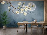 Large floral wall mural in a dining room with light wood furniture.