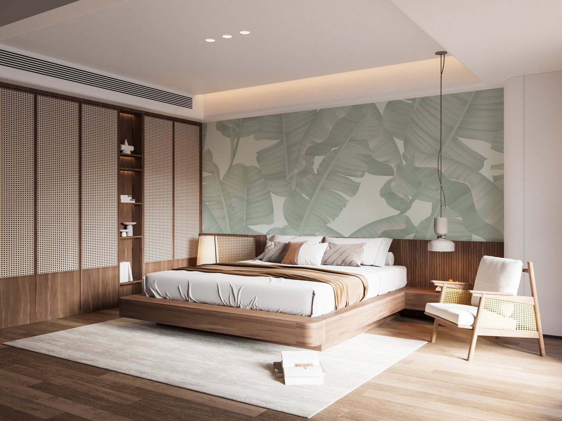 Tropical green leaf wall mural in a bedroom featuring a wooden headboard wall.
