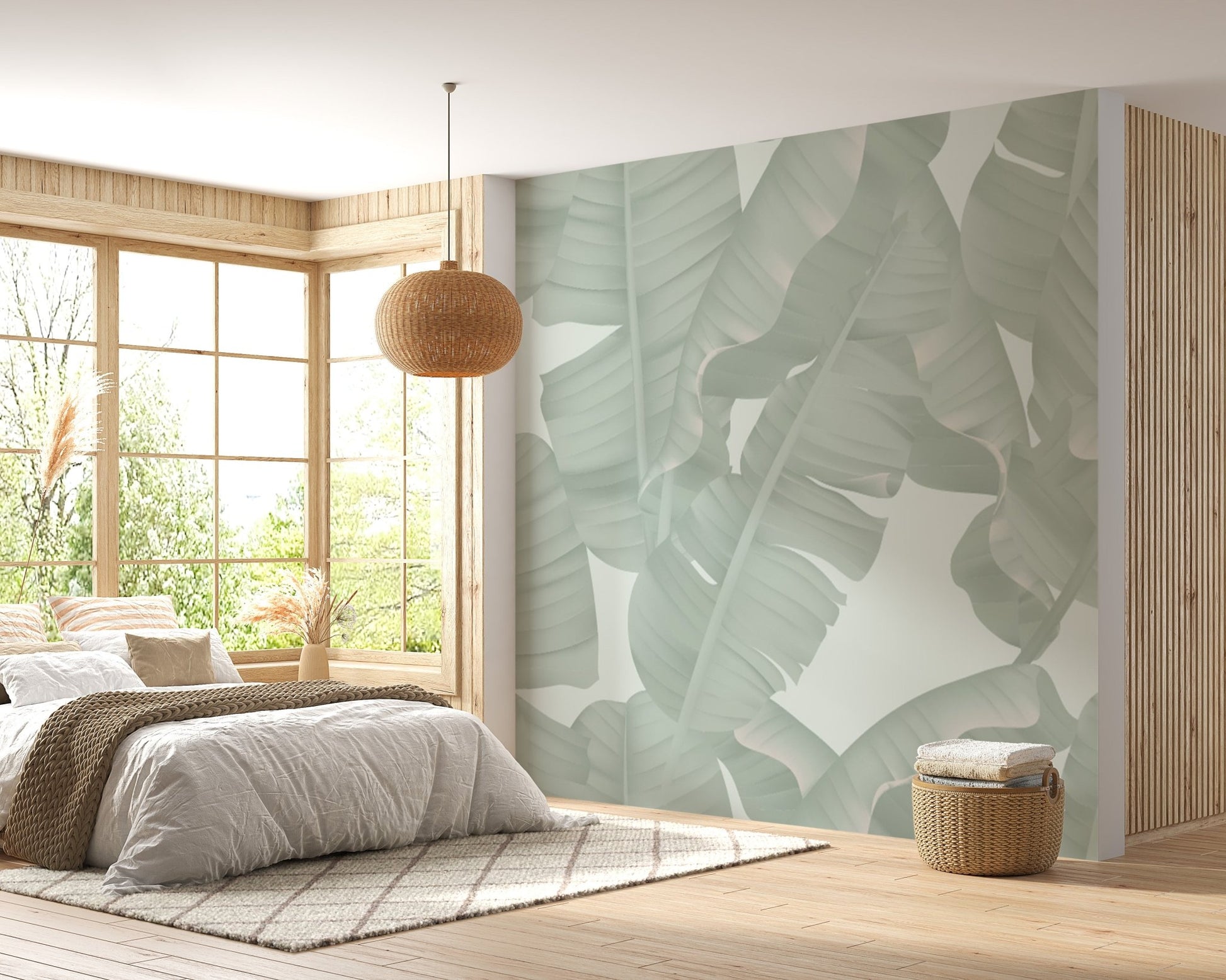 Floral seamless green banana leaves wall murals in a bright bedroom with a window.