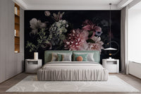 Master bedroom with a teal headboard and a dark floral pattern wall mural.