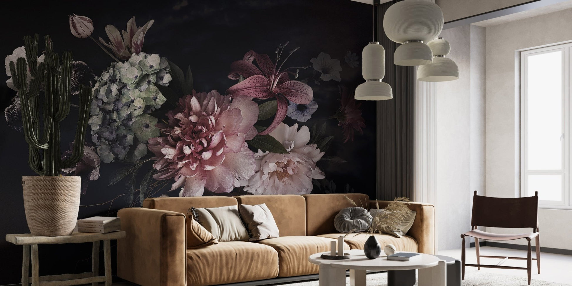 Brown leather couch positioned against a large scale floral wall mural.