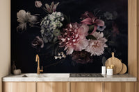 Kitchen backsplash area styled with a dark botanical vase wall mural.
