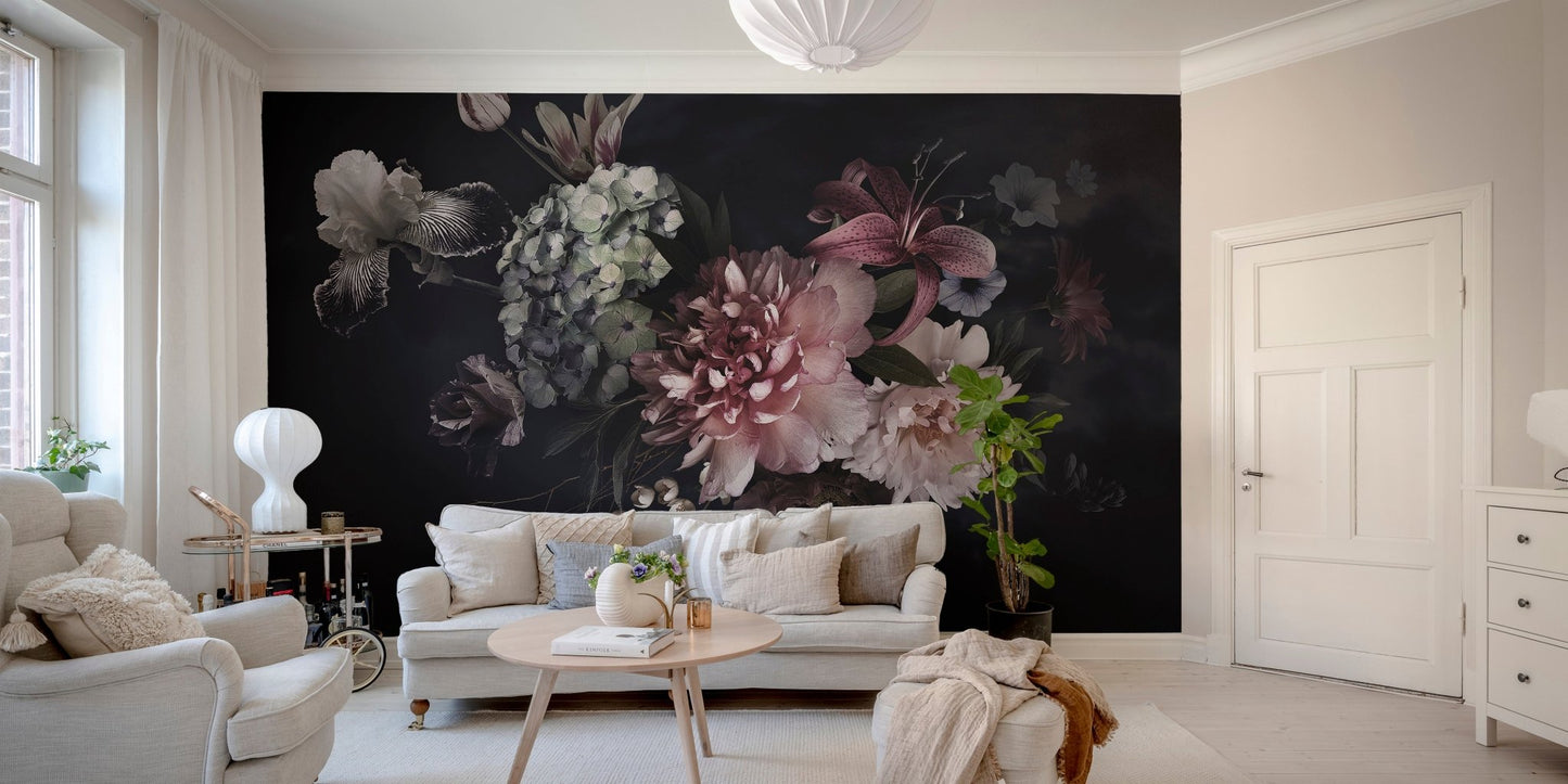 Dark floral wall mural with pink and green blooms in a bright modern apartment.