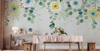 Minimalist side table decor with a flourishing flower wall mural background.