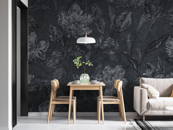 Flower pattern on black background wallpaper in a modern dining room with oak furniture.