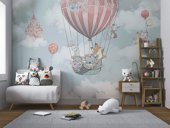 Cute animals in a hot air balloon wall mural in kids play area.