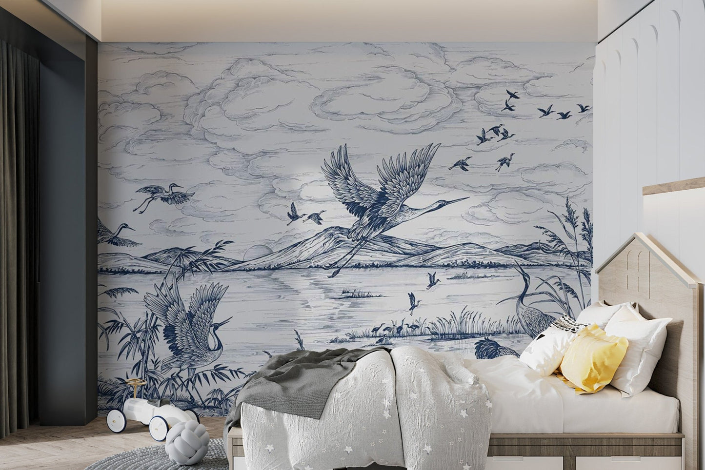 Illustrated flying birds wall mural in blue and white for child's sleeping area.