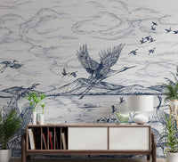 Blue waterside flying bird illustration wall mural for apartment hallways.