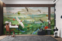 Green hills and flying birds wall mural for a playful study space.