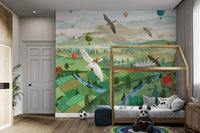 Whimsical valley landscape wall mural with hot air balloons for bedroom