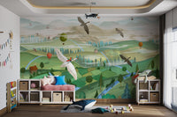 Colorful valley mural featuring flowing rivers, green pastures for playroom.