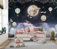 Flying Plane Over Dark Night Kids mural in playroom with white daybed and rug.