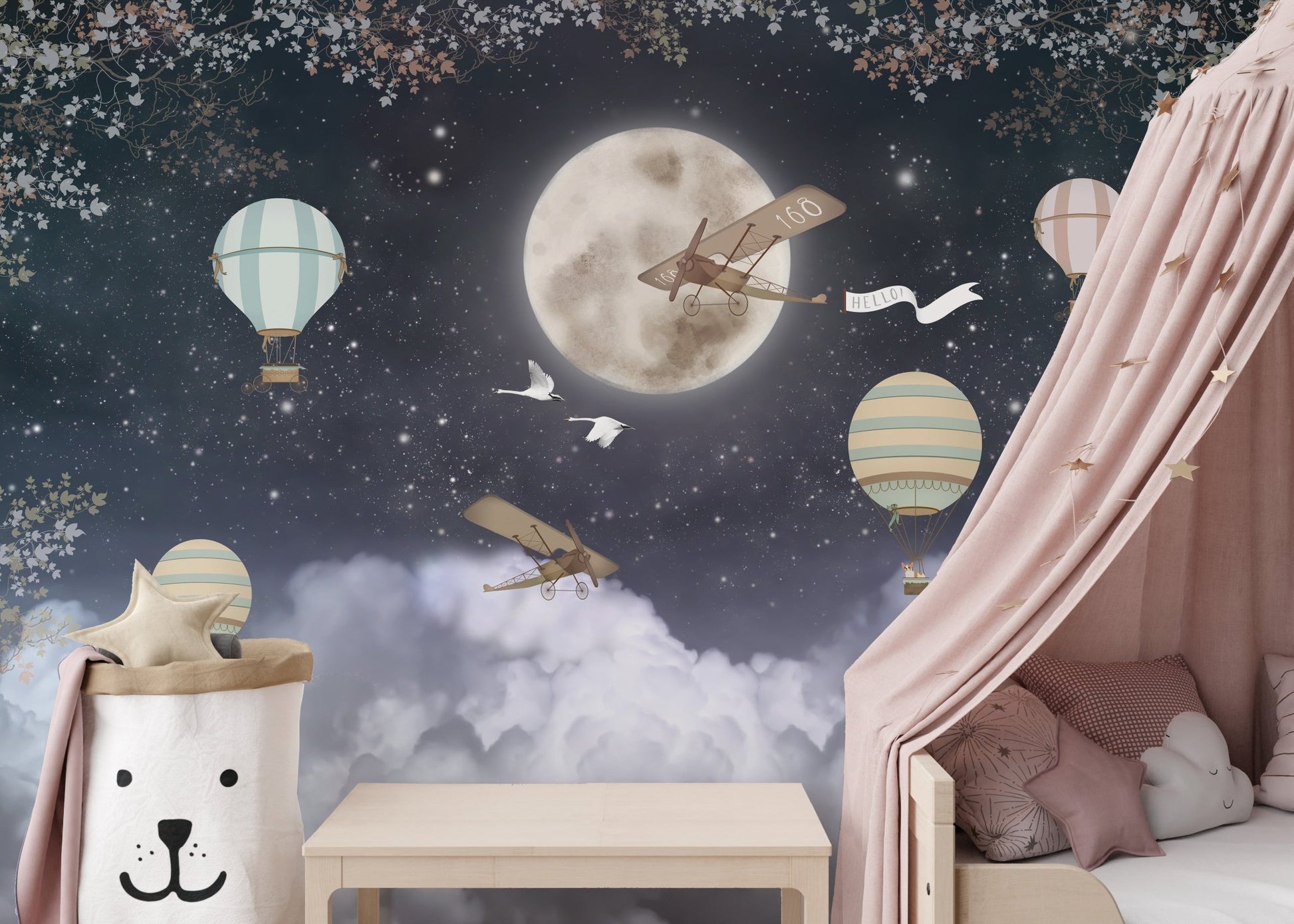 Bedroom wall mural with pink canopy bed and dark sky celestial pattern.