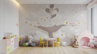 Gentle nursery whale wallpaper wall mural in muted tones.
