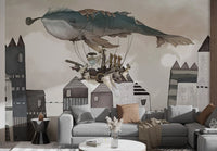 Flying whale with vintage ship wall mural in living room.
