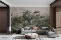 Foggy forest wall mural with tropical greenery in open living area.