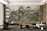 Misty tropical forest wall mural with lush leaves in modern office.
